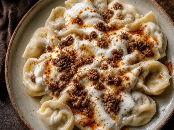 Bosnian Klepe Beef Dumplings with Yogurt, finished dish