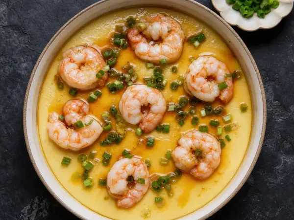 Chinese Cantonese Steamed Egg with Shrimp, original finished dish food photograph
