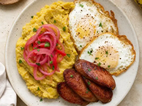 Dominican Mangu with Eggs and Pickled Onion, finished dish