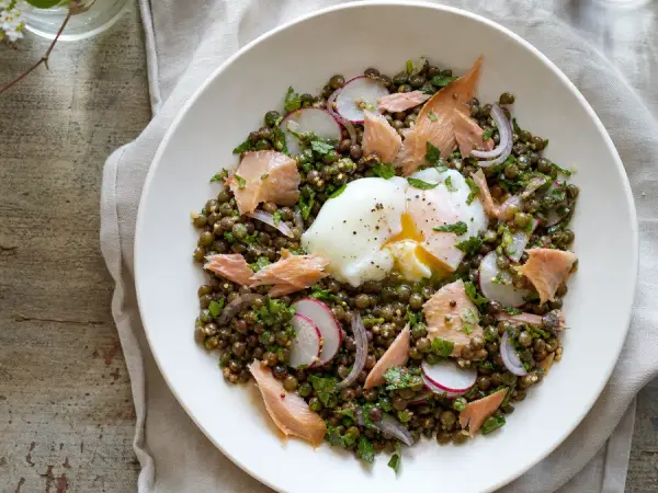 Lentil salad with smoked trout, egg and radishes