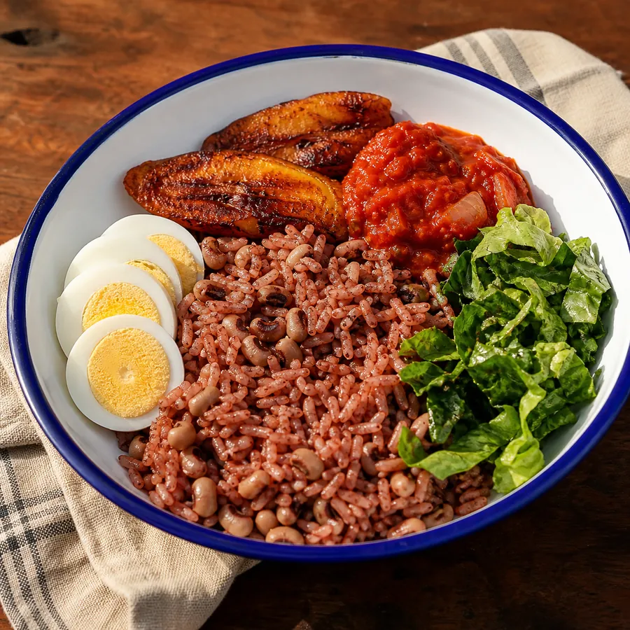 Ghanaian Waakye with egg tomato stew and plantain