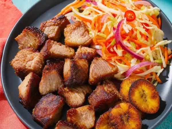 Haitian Griot-Inspired Pork with Citrus Pikliz, finished dish