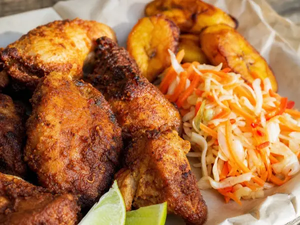 Crisp lime chicken with cabbage-carrot pikliz and fried plantain