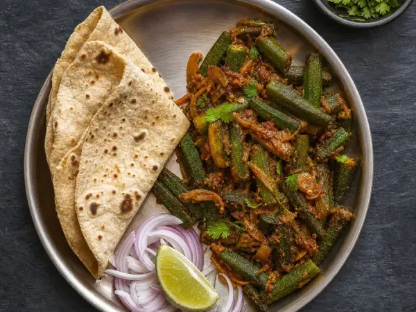 Indian Bhindi Masala with Roti, original finished dish food photograph
