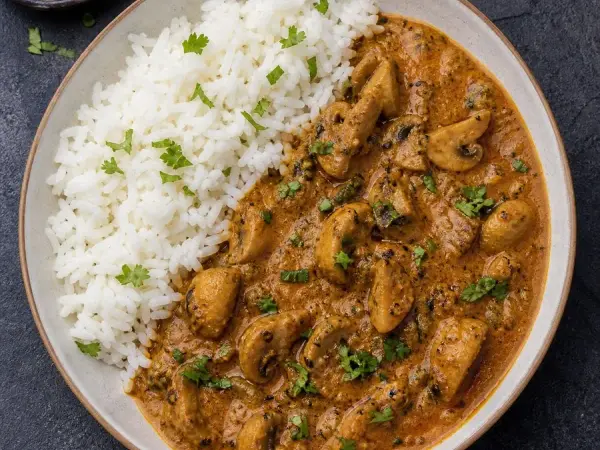 Indian Goan Mushroom Xacuti with Rice, original finished dish food photograph