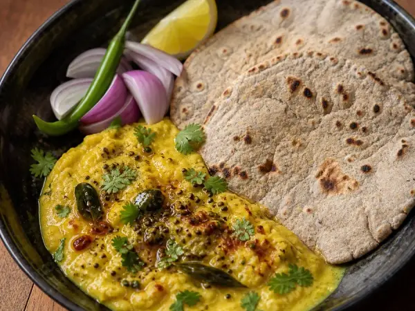 Indian Pithla with Bhakri, original finished dish food photograph