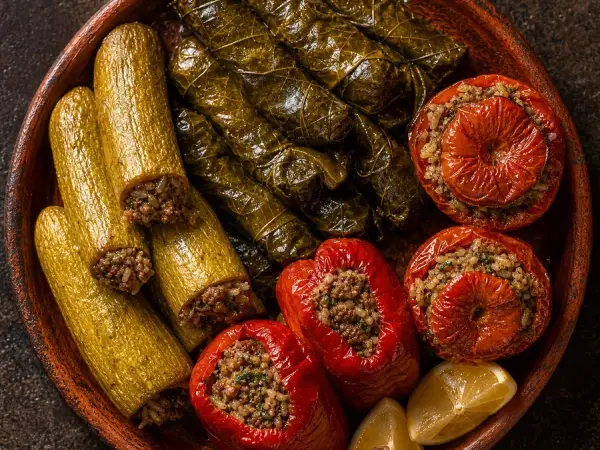 Iraqi Dolma Stuffed Vegetables with grape leaves zucchini and tomato