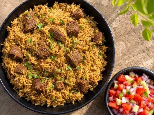Kenyan Beef Pilau with tomato cucumber kachumbari