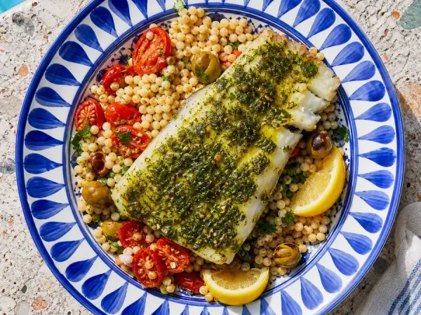 Moroccan Chermoula Cod with couscous, tomatoes, and olives
