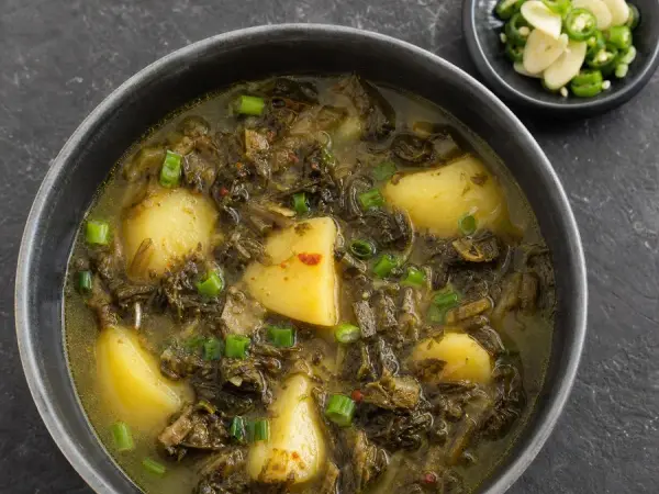 Nepali Gundruk Soup with Potato, original finished dish food photograph