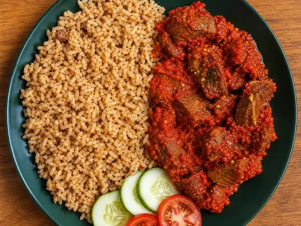 Nigerian Ofada Rice with Beef Pepper Sauce and cucumber