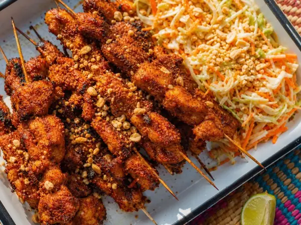 Nigerian Suya Chicken skewers with peanut slaw