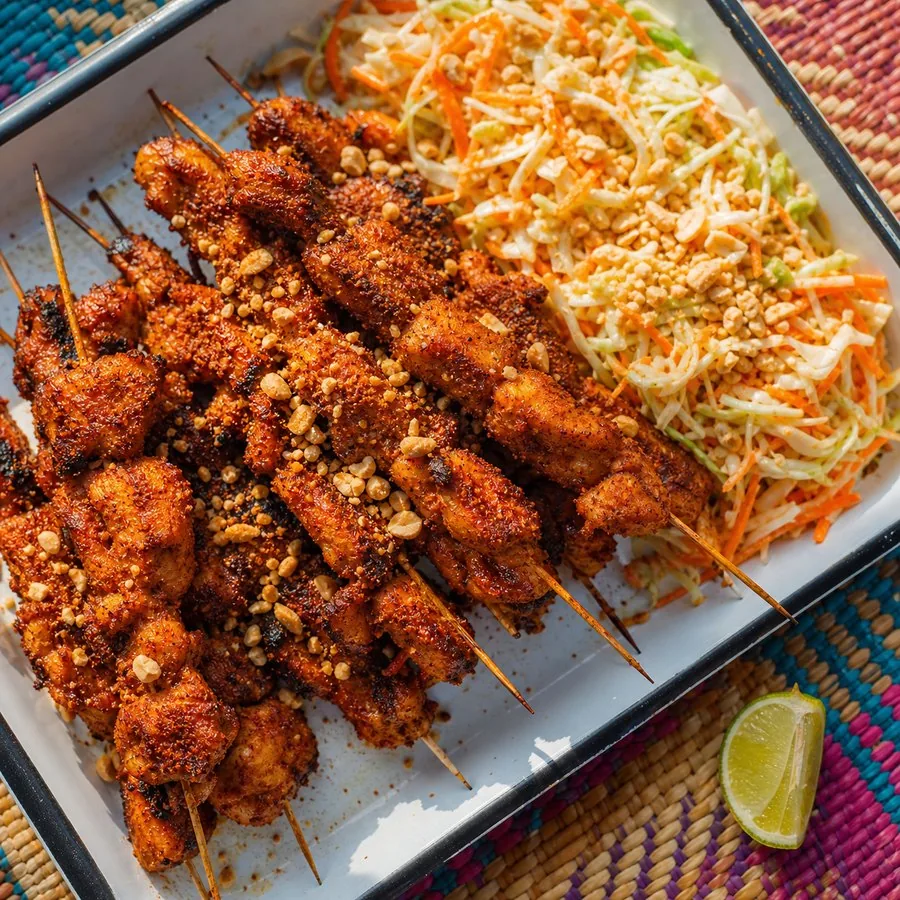 Nigerian Suya Chicken skewers with peanut slaw