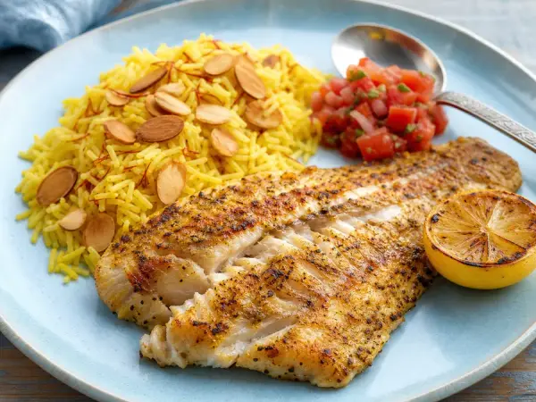 Omani Mashuai Fish with saffron rice and tomato salsa