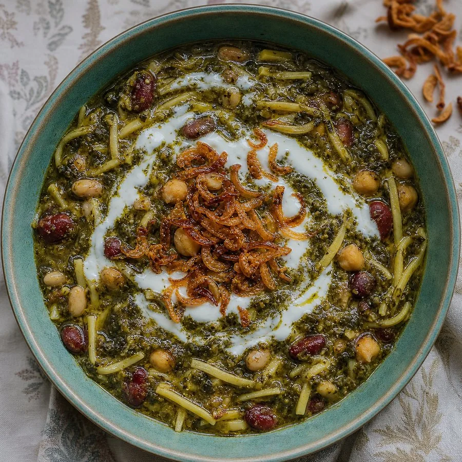 Persian Ash Reshteh with herbs, beans, noodles, and yogurt