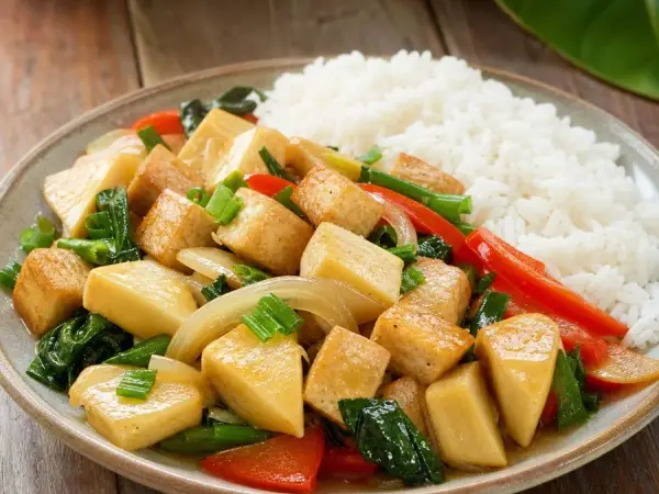 Pohnpeian Breadfruit Tofu Stir-Fry, plated as a finished dinner