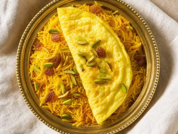 Qatari Balaleet with saffron vermicelli eggs and pistachios