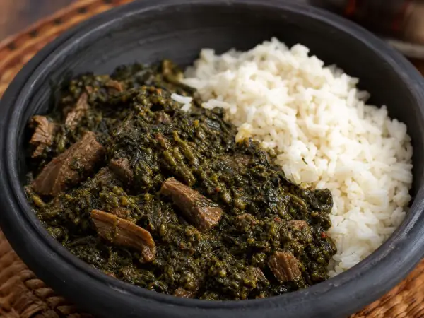 Sierra Leonean Cassava Leaf Beef Stew with rice