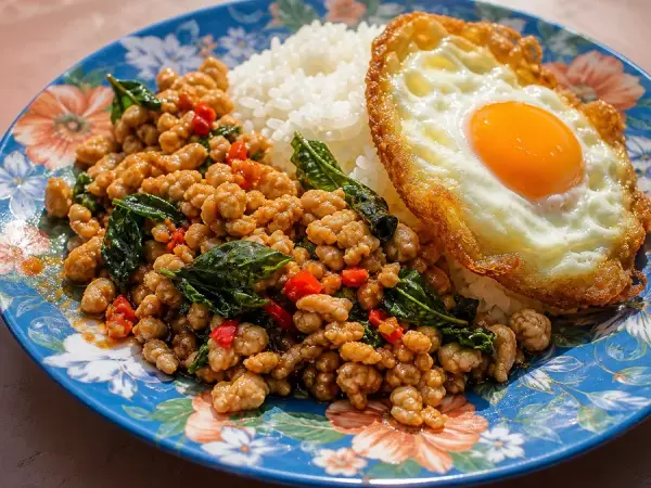 Thai Pad Kra Pao Chicken with Crispy Egg, finished dish