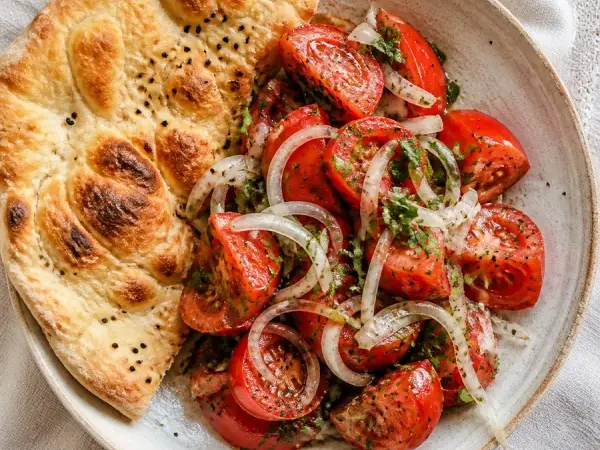 Uzbek Achichuk Tomato Salad with Flatbread, original finished dish food photograph